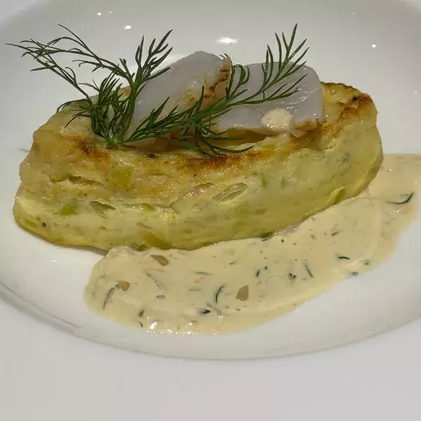 Moelleux de pétoncles à la fondue de poireaux