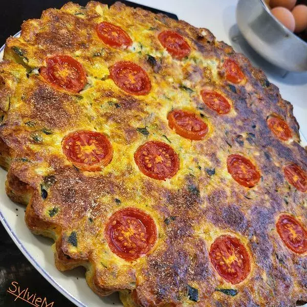 Tarte sans pâte courgettes/ lardons/ tomate cerise 