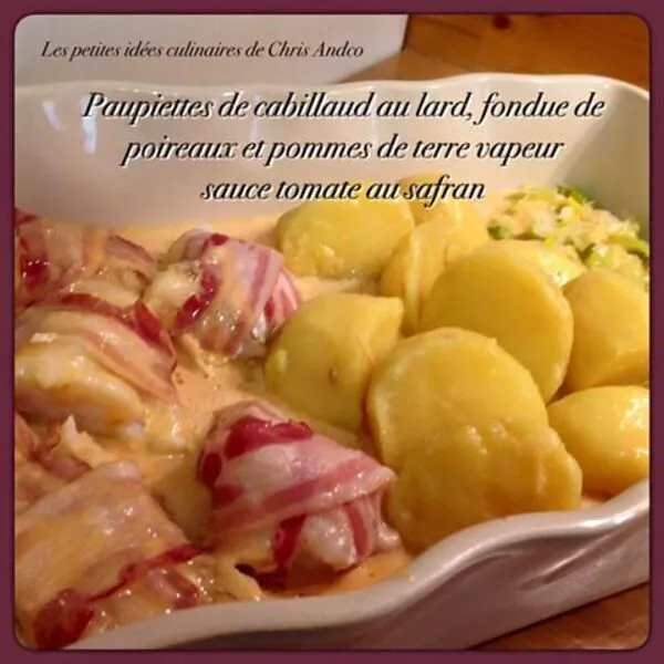 Paupiettes de cabillaud au lard fumé, pommes de terre vapeur et fondue de poireaux , sauce safran à la tomate